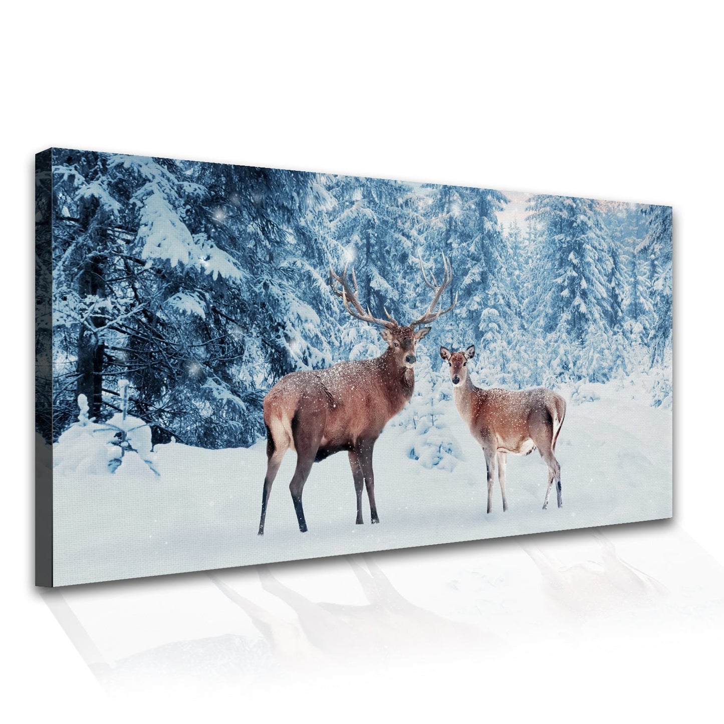 Family of noble deer in a snowy winter forest Canvas Wall Art Painting